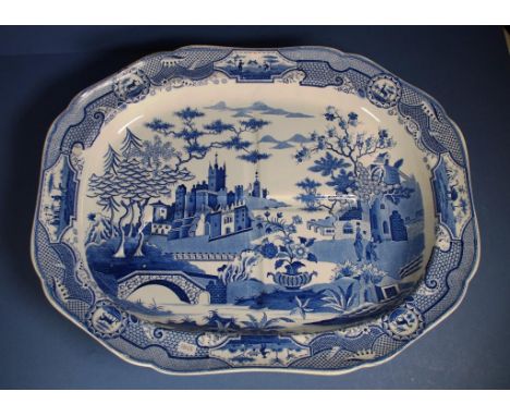 Spode 'Gothic Castle' pattern meat platter footed, with depression for collection of sauce. Hairline crack to rim. Unmarked t