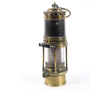 A brass Thomas &amp; Williams Welsh miners lamp. Stamped with the fleur-de-lis, H25cm