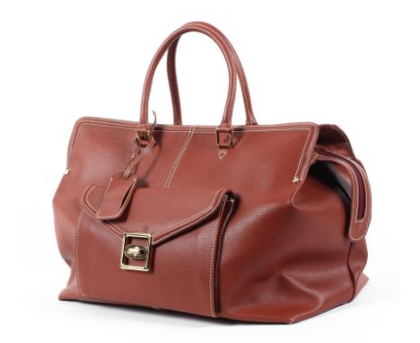 An Escade burgundy leather travel bag and dust bag Condition Report: Overall in good condition-hardly used. Some scuffs to th