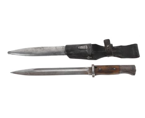 A 1939 German bayonet including scabbard, forge stamped F Herdera Snr. Blade stamped 8530 and the scabbard 5611