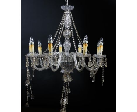 A large 20th century nine branch chandelier. The knopped baluster stem moulded with diamond pattern, with six S-shaped branch