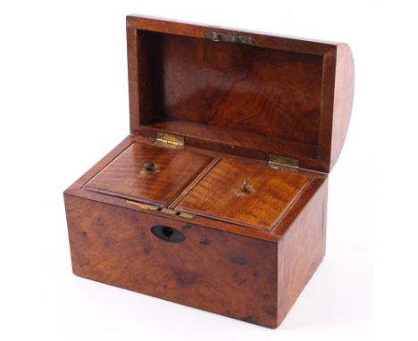 A 19th century burr walnut domed tea caddy. The cover inlaid with mother-of-pearl oval medallion, the interior fitted with tw