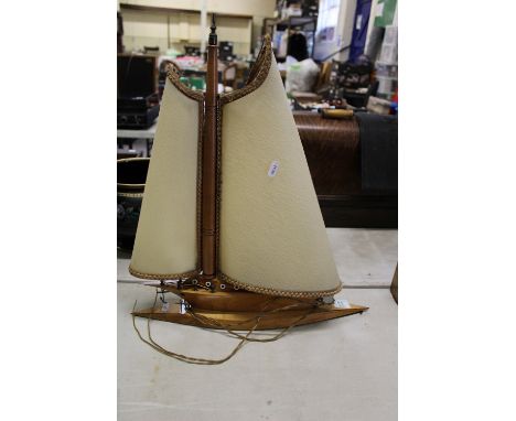 1950's wooden table lamp in the form of a yacht: Length 49cm. 