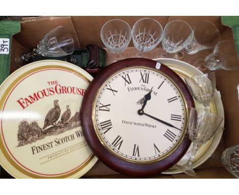 A mixed collection of items: Famous Grouse wall clock, Famous Grouse drinks trays x 2, hock glasses etc (1 tray). 