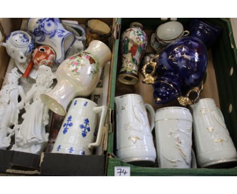 A mixed collection of ceramic items: vases, jugs, continental figures etc (2 trays). 