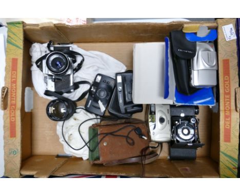A collection of camera equipment to include: Praktica MTL3 ( zeiss lens fitted) , Kersaw Eight 20 Bellows camera, Boxed Olymp