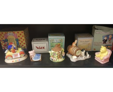 A mixed collection of items to include: Border Fine Arts Clock Figure, Limited Edition Toyland figure, Royal Doulton Winnie t