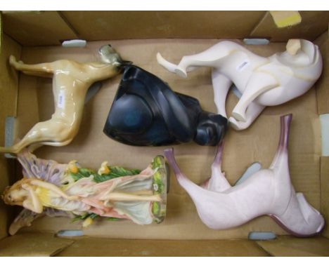 Three large/heavy stylised animal figures: together with an unmarked ceramic Great Dane and a large resin fairy figure (1 tra