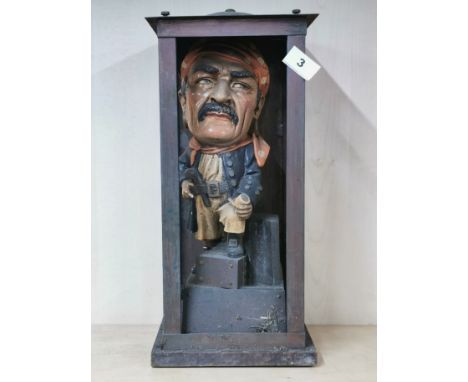 An interesting vintage painted ceramic figure of a pirate in a handmade copper case, H. 43cm. possibly an advertising item. C