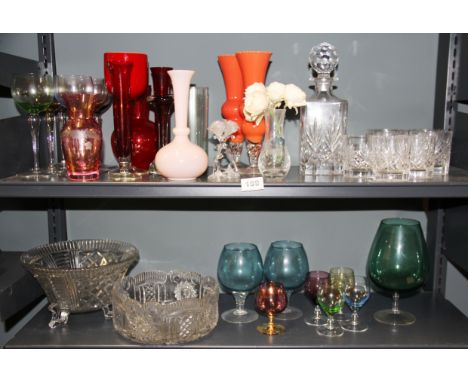 A cut glass decanter, glasses and other items.