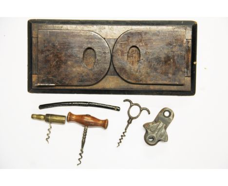 A Victorian folding bookrack, 3 corkscrews, a Japanese letter opener and a LMS railway item.