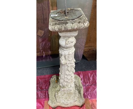 A vintage concrete sundial, H. 80cm.