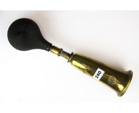 An antique Desmo brass car horn.