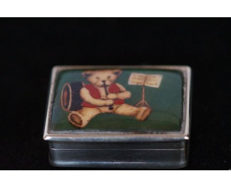 Silver pill box with painted enamel 