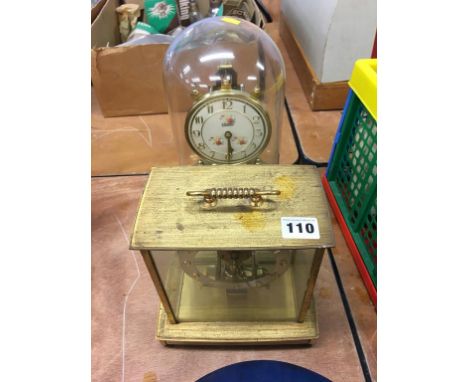 An Anniversary clock and one other (2)