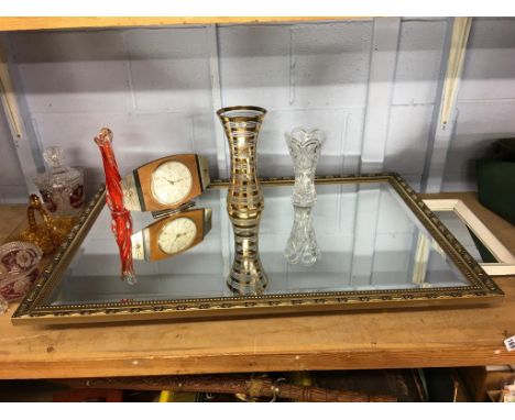 A Metamec clock and mirrors etc.
