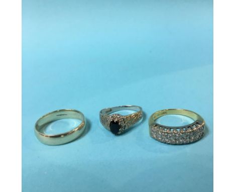 A 9ct gold ring, 3.9g and two 18ct gold rings, 8.5g