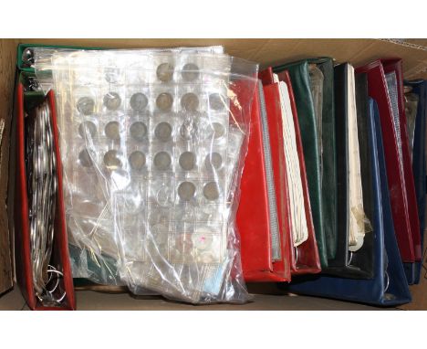 A box of thirteen coin collectors albums - eight 12in x 11in, five 8.5in square, all ring binders with plastic pocket inserts