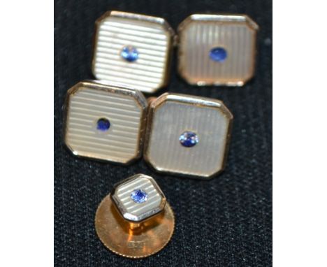 A pair of mother of pearl effect and pale blue stone possible spinel inset 9ct gold cufflinks and collar stud, Deakin &amp; F