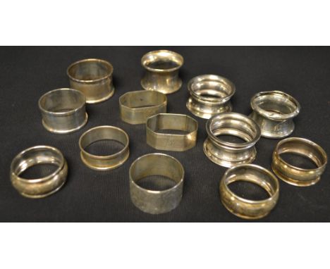 A Victorian silver napkin ring, Sheffield 1875; another pair, Birmingham 1923; others, 19th century and later, all hallmarked