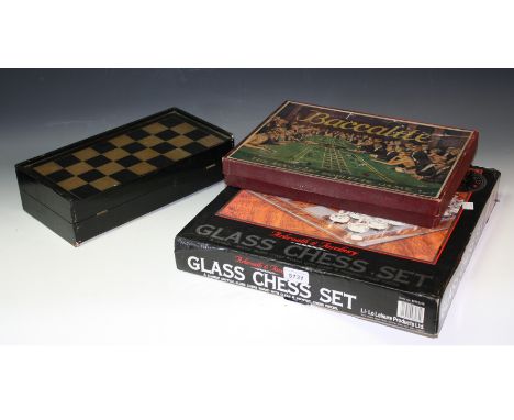 An early 20th century Baccalite, The Electric Roulette game, by Chad Valley; a glass chess set; another (3)