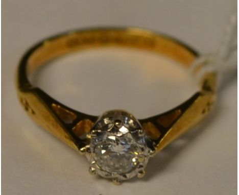 A diamond solitaire ring, round brilliant cut diamond approx 0.30ct, platinum claw, 18ct gold shank, Birmingham 1989, size K,