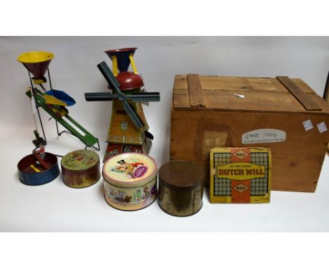 A vintage American McDowell Toys tinplate sand toy "Mac Dutch Mill", sectional lithographed tinplate mill with four blades, c