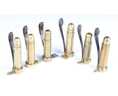 A group of six steel mounted brass pinfire decapping tools, including James Dixon &amp; Sons 12-bore, G. &amp; J.W. Hawksley 