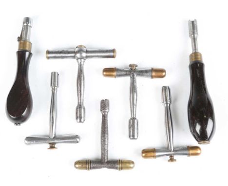 A group of five 19th century steel T-shaped combination nipple extractor tools with brass fittings, the brass threaded caps r