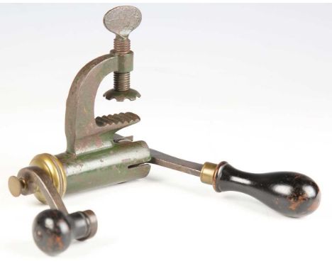 A scarce late 19th century roll turnover combination 8-bore cartridge reloading tool by Lightwood &amp; Son, Birmingham, with