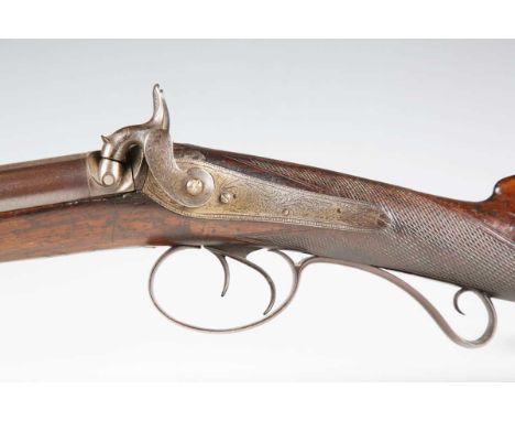 A mid to late 19th century double-barrelled percussion shotgun by W. Howell, London, with Damascus steel barrels, barrel leng