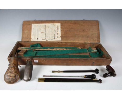 A small collection of 19th century shooting relating items, including an air cane box of boarded construction, bearing interi