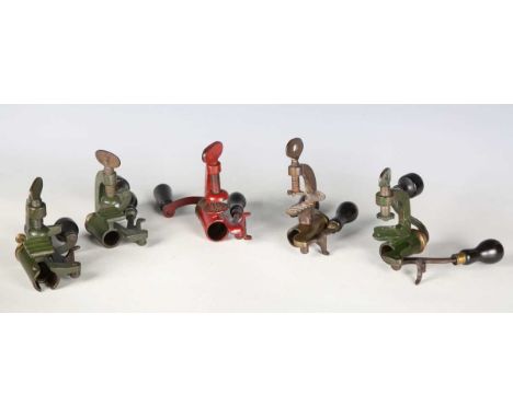 A group of five various late 19th century roll turnover cartridge reloading tools, including a 12-bore example, marked 'Jeffr