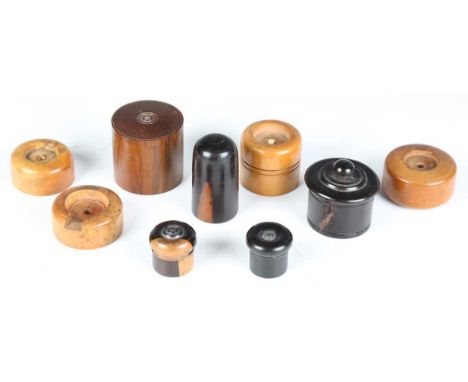 A small group of 19th century treen shooting related items, including percussion cap boxes, four recapping bases and various 