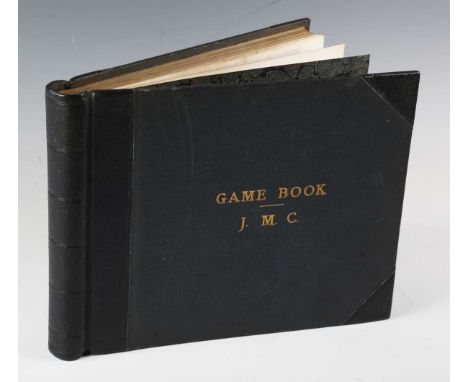 An early 20th century blue leather and part cloth bound game hunting ledger/register belonging to James M. Carnegie (1908-198