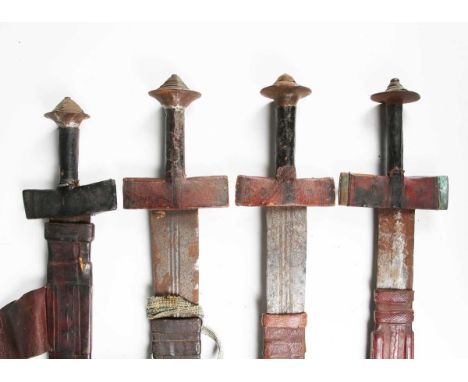 A group of four late 19th century Sudanese kaskara swords with a variety of fullered and plain blades, length of longest blad