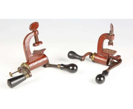 Two late 19th century roll turnover combination 12-bore cartridge reloading tools, one marked 'Bussey &amp; Co London', the o