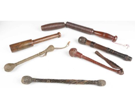 A group of five late 19th/early 20th century life-preservers, including a turned wood two-piece truncheon, a fine black and w