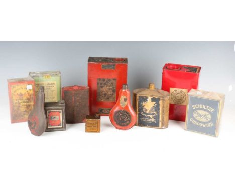 A large collection of various late 19th century gunpowder tins and dispensers, including a large Curtis's &amp; Harvey's Spor