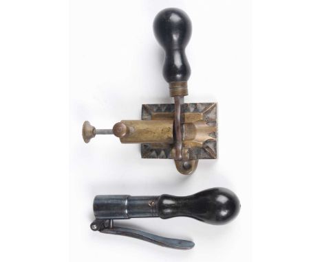 An unusual late 19th century .577/.450 rifle cartridge creasing tool, the rectangular moulded brass base stamped to one end w
