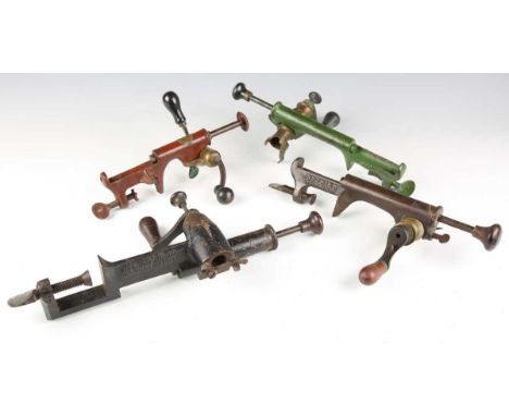 A group of four 19th century Jefferies Patent bench-mounted combination and other cartridge loading tools, comprising three 1