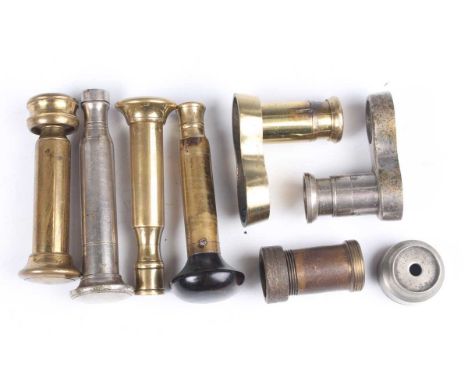 A group of four late 19th century cartridge decapping tools and two associated spring-loaded capping bases, including a James