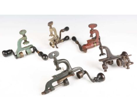 A group of five roll turnover cartridge reloading tools, probably Continental, including 20 and 12-bore examples, all with ca