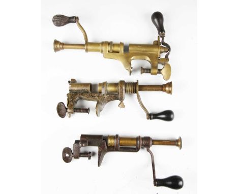 A group of three brass and steel cartridge reloading tools, including a Bartram &amp; Co Patent 12-bore example. Provenance: 