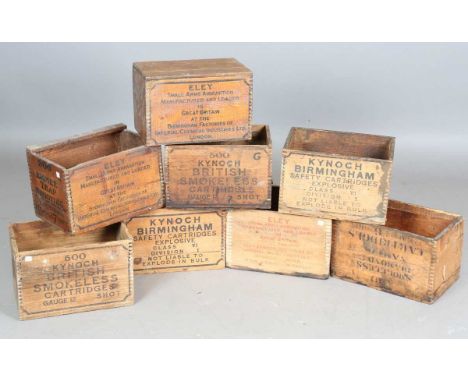 A group of eight early 20th century Eley and Kynoch wooden packing crates or boxes with detailing to the sides, including 'Em