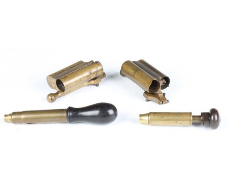 Two mid to late 19th century double-barrelled patent lacquered brass 12-bore cartridge redecapping tools, one detailed 'R7035
