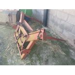 Bale Spike with homemade hydraulic ram system that moves the bale at 45degree angle.