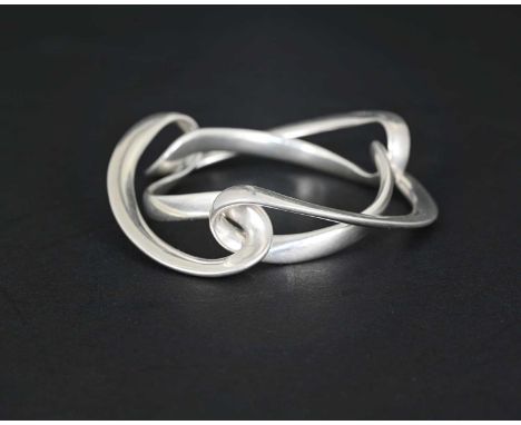 Regitze Overgaard for Georg Jensen, a Danish Modernist silver Infinity bracelet, model 452, designed 2004, three interlocked 