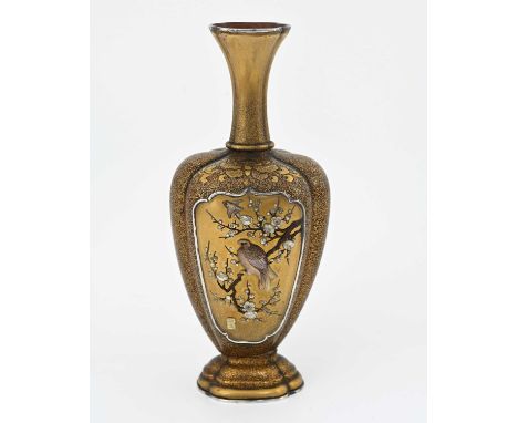 A Japanese Shibayama lacquer vase, Meiji, lobed shouldered and footed form, the maki e ground with raised and tooled gilt mot