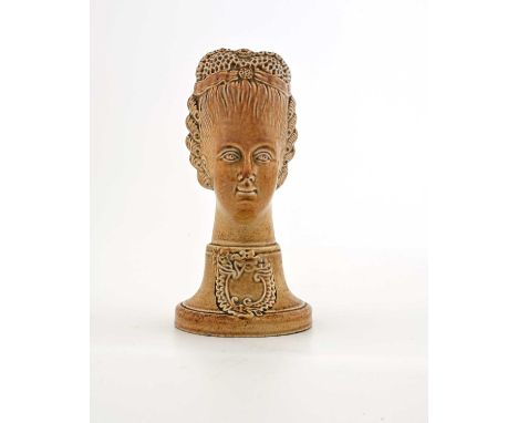 A salt glazed stoneware figural novelty hat pin stand, probably 19th century Chesterfield, modelled as the head of Marie Anto